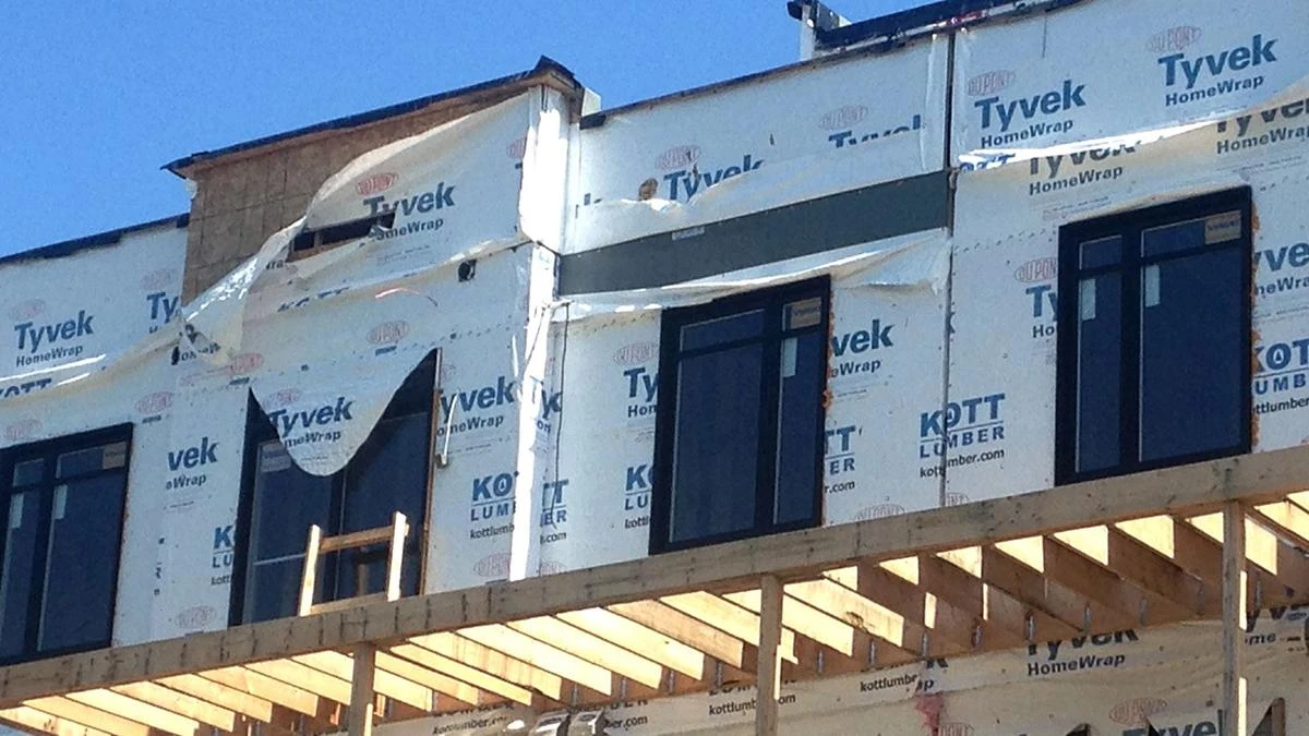 Building envelope wall assembly with weather barrier under construction in Vancouver